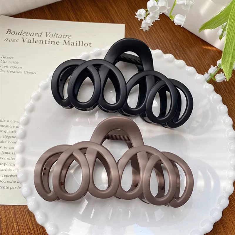 Cheveux creux gelés Claw Bow Hair Clip Crab Épingle à cheveux élégante Femmes Barrette Tête solide Accessoires de cheveux de mode coréenne simple – Image 4