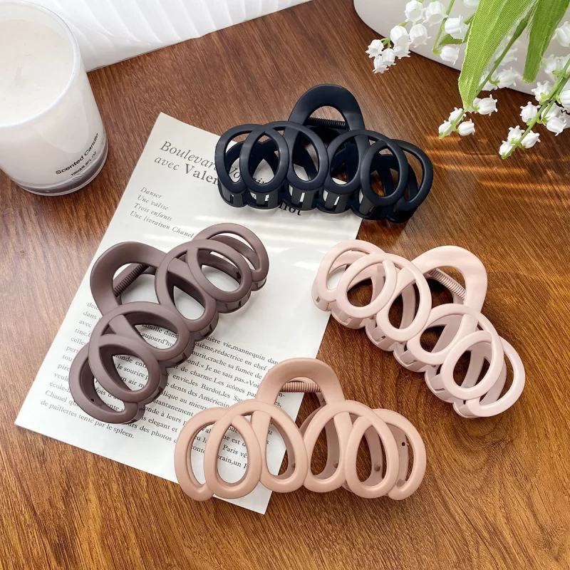 Cheveux creux gelés Claw Bow Hair Clip Crab Épingle à cheveux élégante Femmes Barrette Tête solide Accessoires de cheveux de mode coréenne simple – Image 2